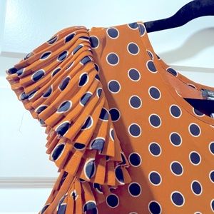 Ann Taylor - Orange + navy polka dot blouse with ruffled sleeves!